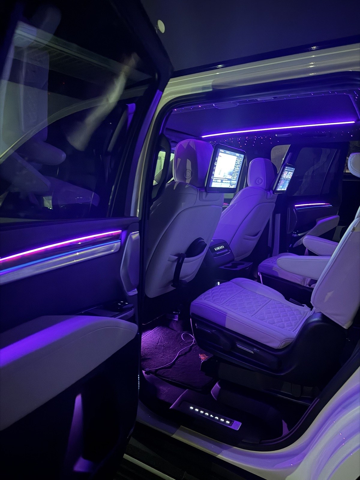 Large SUV purple ambient lighting